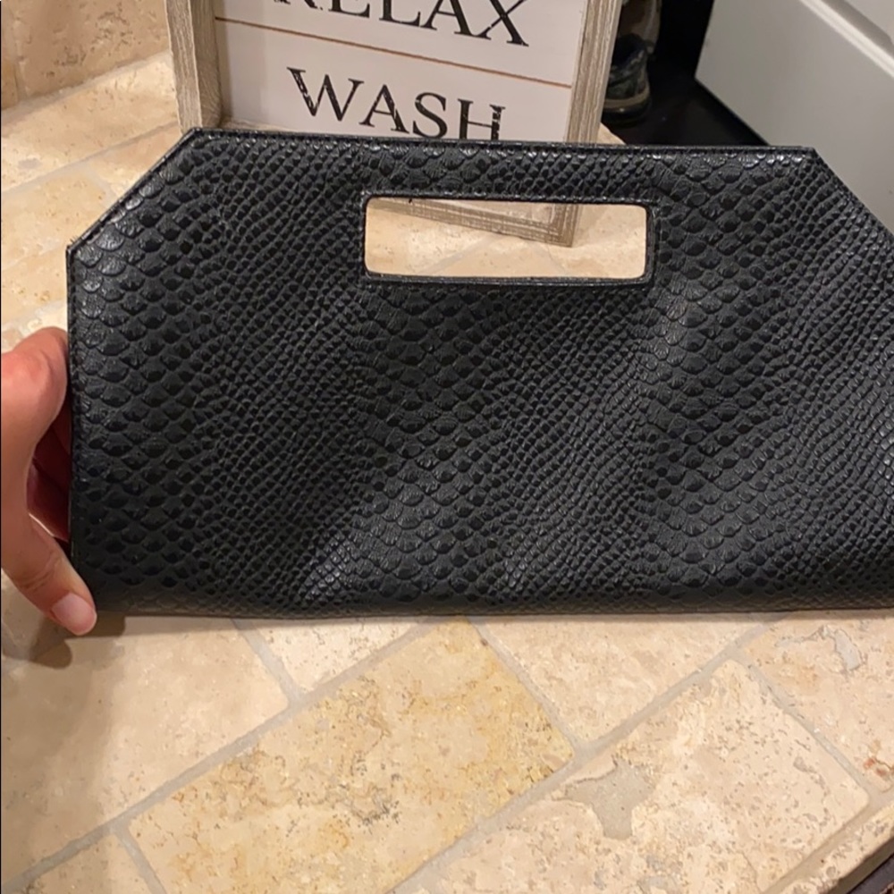 Black snack print clutch